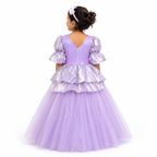 Child wearing a purple princess dress with puffed sleeves.